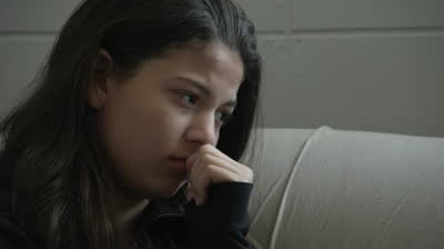 stock-footage-troubled-teenage-girl-close-up-shot